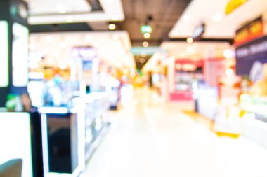Bokeh ile soyut bulanıklık ve arka plan için mağazadaki dağıtılmış alışveriş merkezleri
