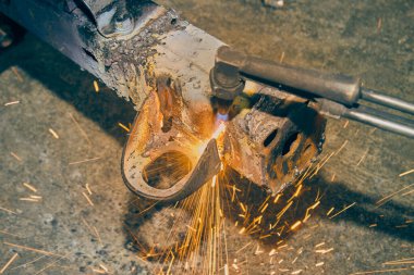 Top View Car Part Siloval by Oxygen Asetilene Cutting Technique with Small Sparkle in Vintage Tone