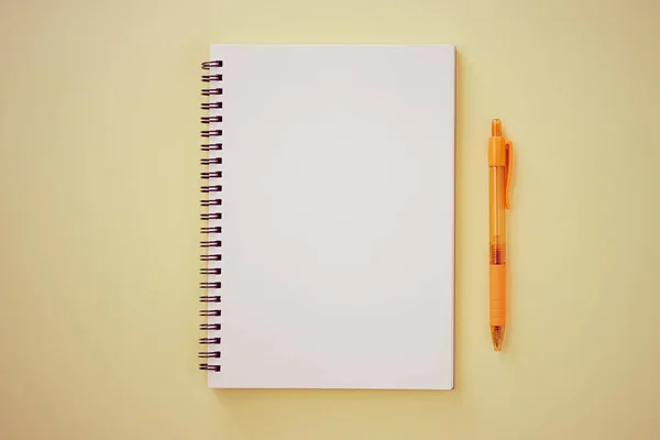 Spiral Notebook Spring Notebook Unlined Type Orange Pen Pastel Yellow — Stock Photo, Image