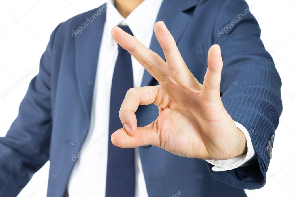 Businessman with OK Sign Hand Gesture Isolated on White Backgrou