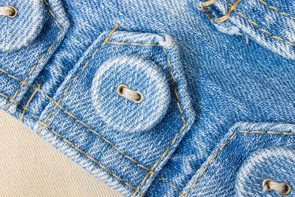 Jeans knop op Jeans stof Tag helling weergave — Stockfoto