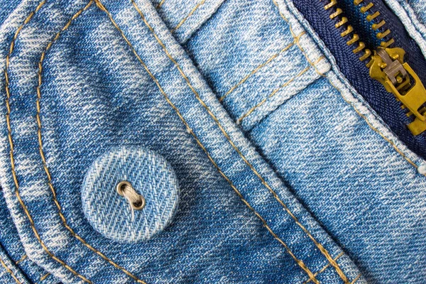Jeans knop bodem verlaten hoek met een deel van de zak en Zip — Stockfoto