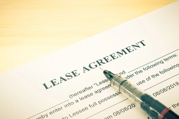 Lease Agreement Contract Document and Pen at Bottom Right Corner Vintage Style — ストック写真