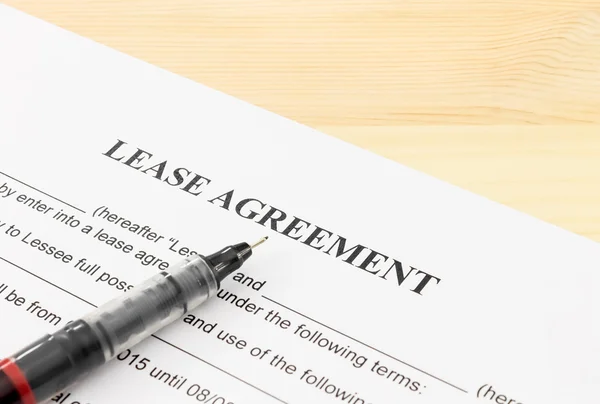 Lease Agreement Contract Document and Pen Bottom Left Corner — 스톡 사진