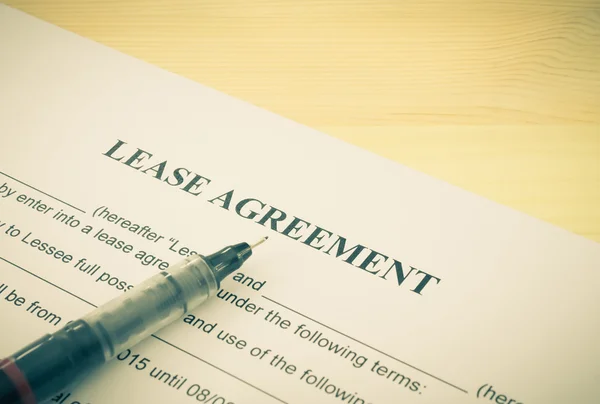 Lease Agreement Contract Document and Pen Bottom Left Corner Vintage Style — Stockfoto