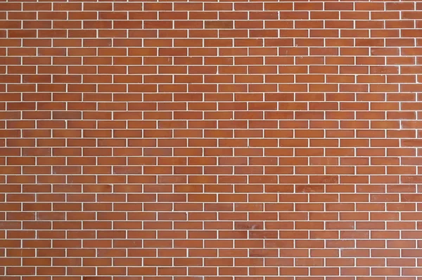 Simetrik kırmızı tuğla beton duvarın deseni ve yüzeyi