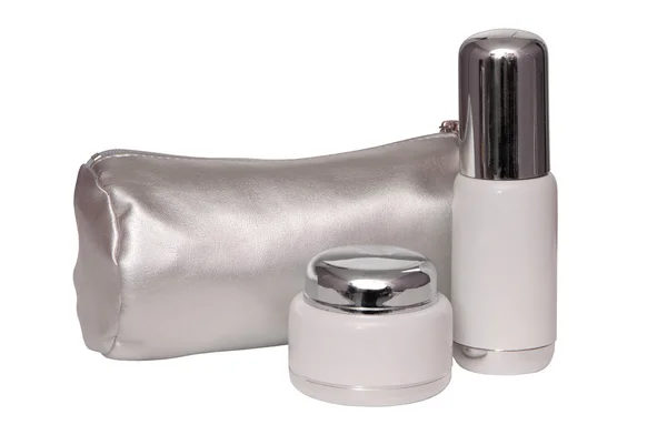 Silvery cosmetics handbag and cream — Stock Photo, Image