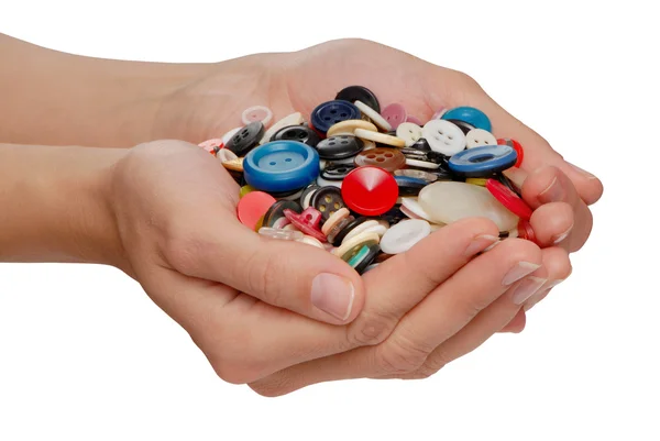 Buttons in female hands — Stock Photo, Image