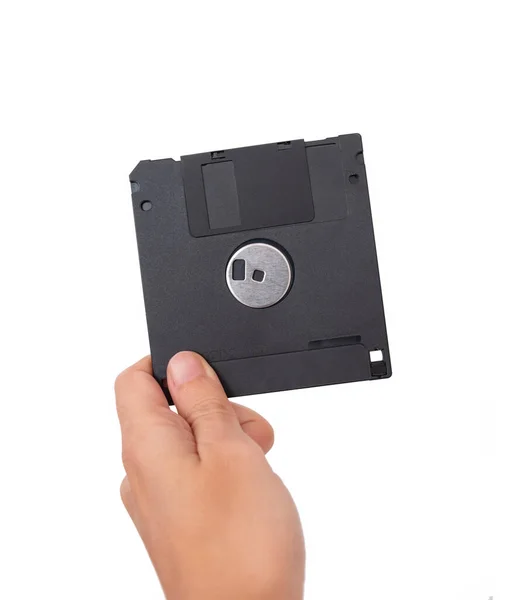 Női Kéz Kezében Egy Fekete Floppy Lemez Hátsó Oldal Elszigetelt — Stock Fotó