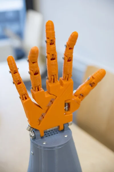 Orange Colored Robotic Hand — Stock Photo, Image