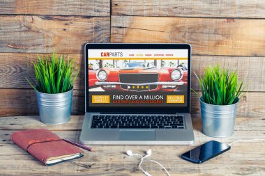 Auto repair on line shop in a laptop screen. clipart