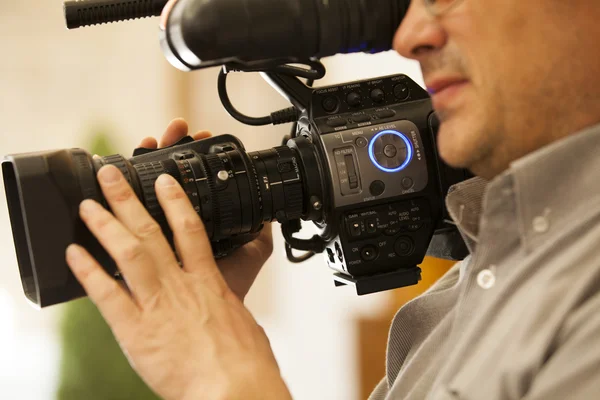 Detail van de camera mens op het werk. — Stockfoto