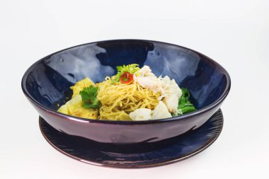 dried egg noodle and wonton crab Decorated with crab meat