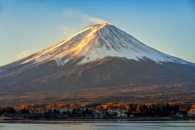 Mt Fuji  the early morning on the lake kawaguchiko. in autumn color