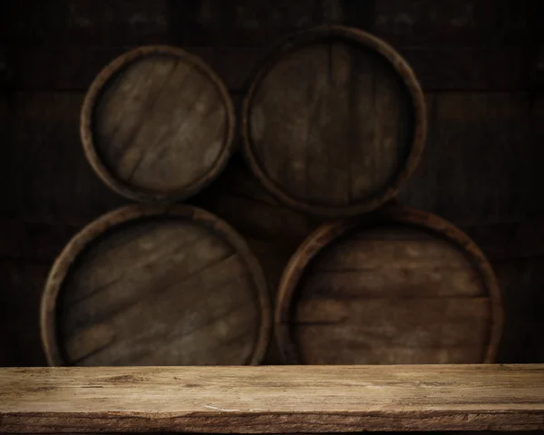 background barrel and worn old table of wood