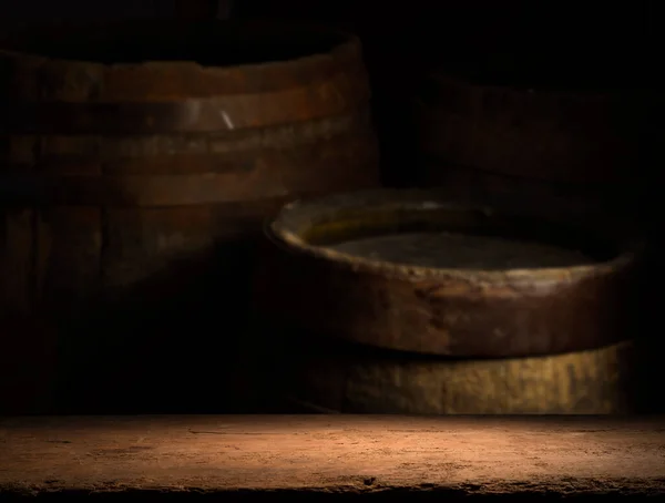 Background of barrel and worn old table of wood — Stock Photo, Image