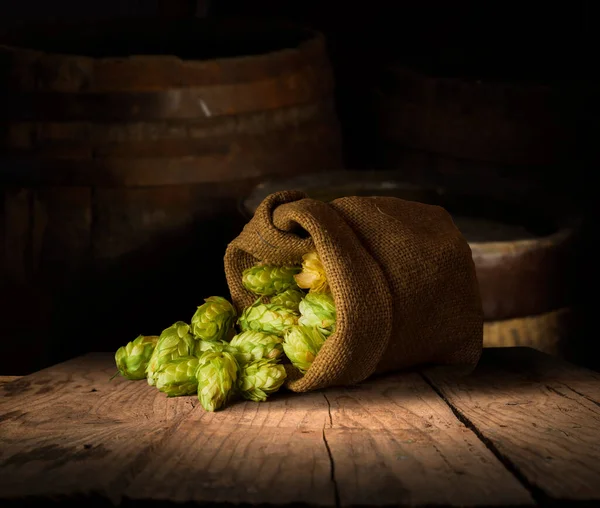 Glass beer on wood background with copyspace