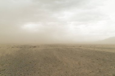 sandstorm in the gobi desert in mongolia clipart