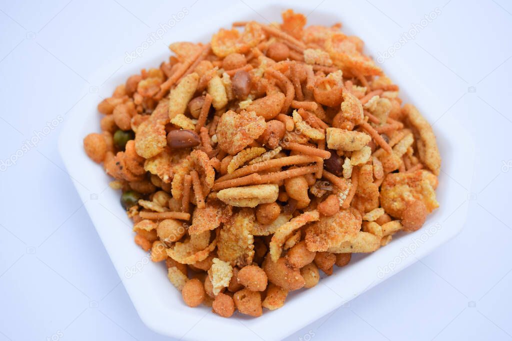 Tasty south indian mixture for tea time snack. On white background isolated.