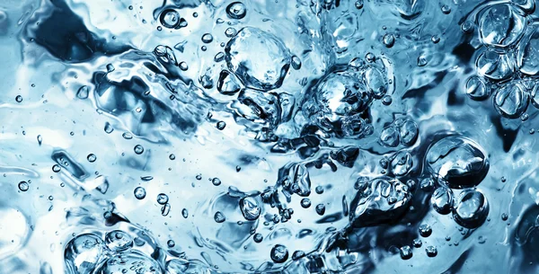 Water wave with bubbles — Stock Photo, Image