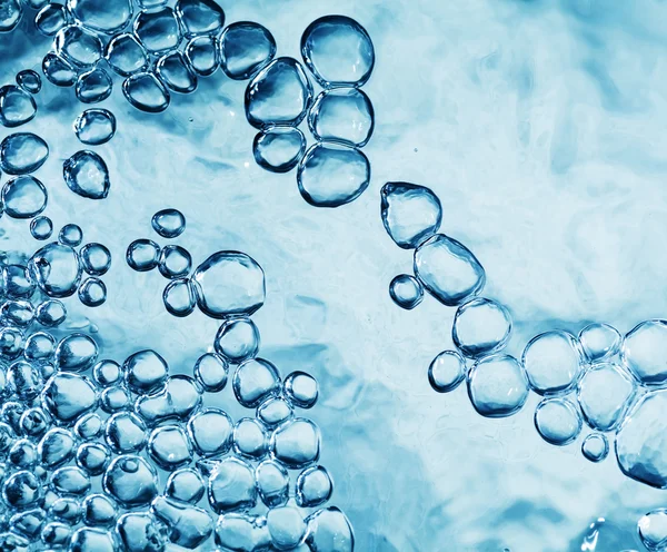 Blue water with bubbles — Stock Photo, Image