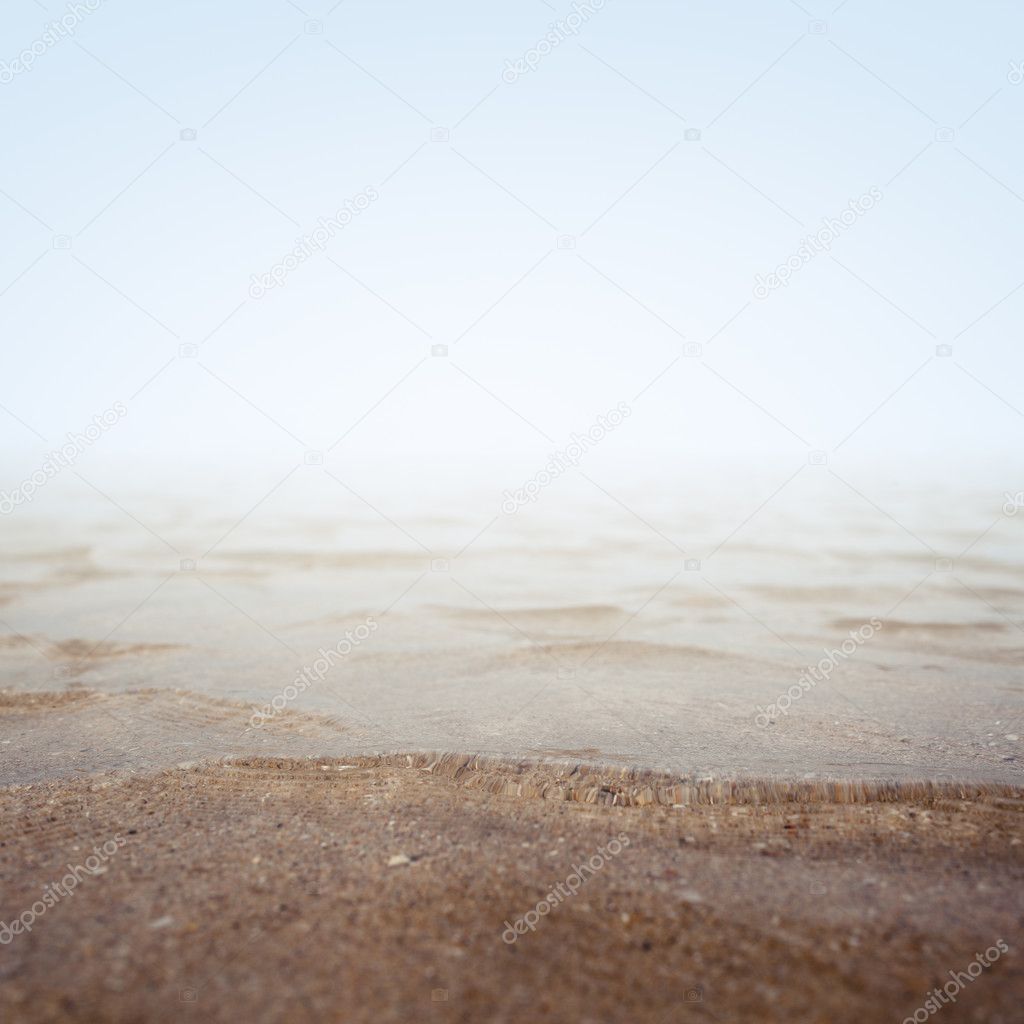 Sand on the ocean shore background