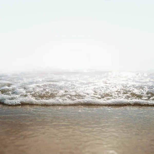 Mar e areia na praia — Fotografia de Stock