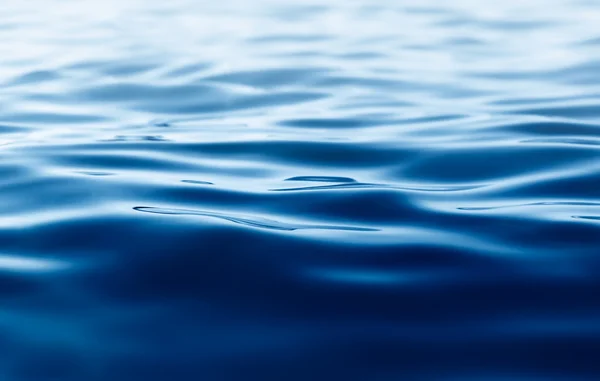 Sfondo blu acqua con increspature — Foto Stock