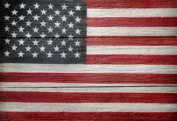 Amerikanische Flagge der USA auf altem Holzgrund. Unabhängigkeitstag am 4. Juli, Gedenktag und Veteranentag Stockbild