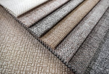 Mobilya üretimi için renkli kumaş örnekleri kataloğu. Mobilya koleksiyonu kumaşlar seçici odak