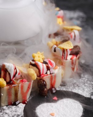 Meyveli börek. Renkli ekmekler.