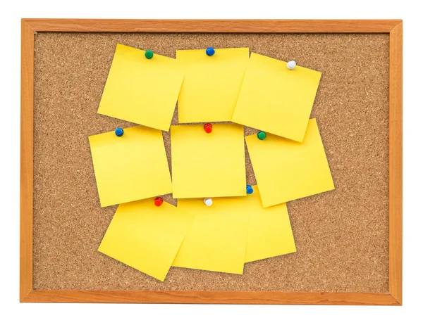 Yellow blank note on Cork board on isolated white with clipping — Stock Photo, Image