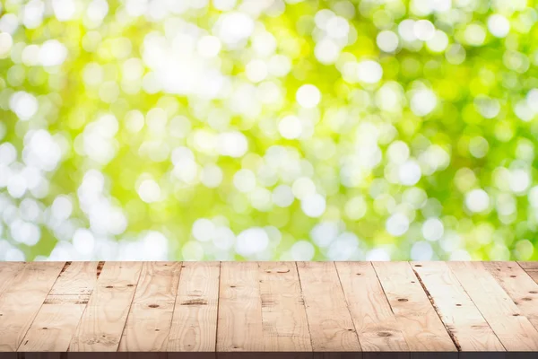 Pantalla bokeh verde y fondo de mesa de madera con espacio para p —  Fotos de Stock