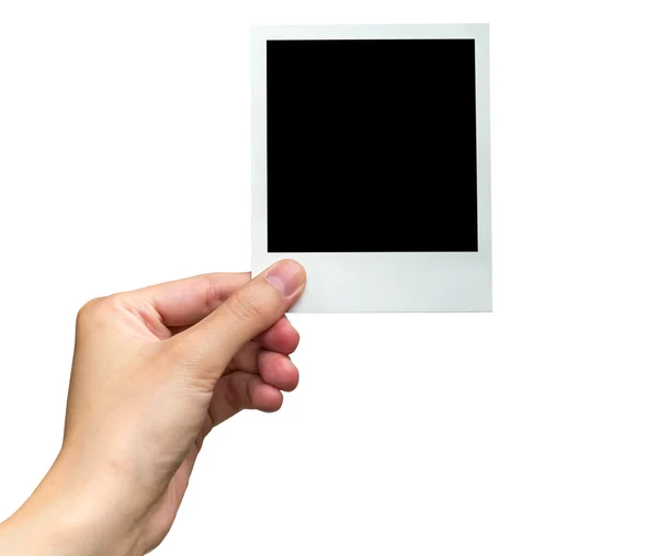 Hand hält Fotorahmen auf isoliertem Weiß mit Clipping-Pfad. — Stockfoto