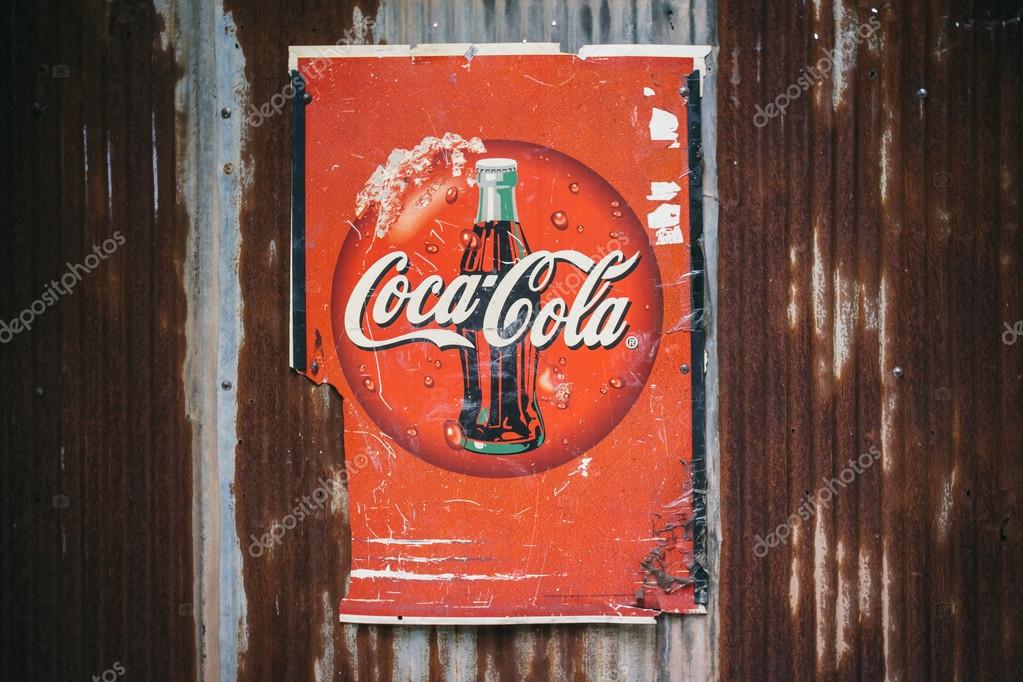CHIANG MAI,THAILAND -AUG 23: Old rust condition vintage of Coca Cola logo. on August 23, 2014 in Chiang Mai Thailand.