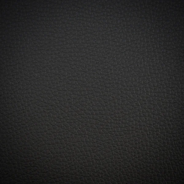 Close-up van zwart leder texture en achtergrond. — Stockfoto