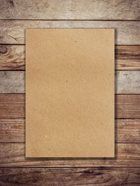 Brązowego papieru na drewno tło i tekstura — Zdjęcie stockowe