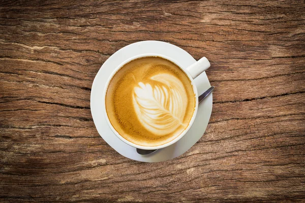 Über Kaffee auf Holz Textur und Hintergrund mit Raum. — Stockfoto