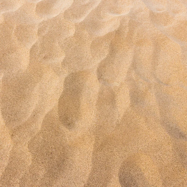 Textura de areia e fundo — Fotografia de Stock