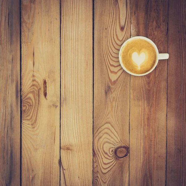 Latte caffè su fondo legno e texture con spazio — Foto Stock