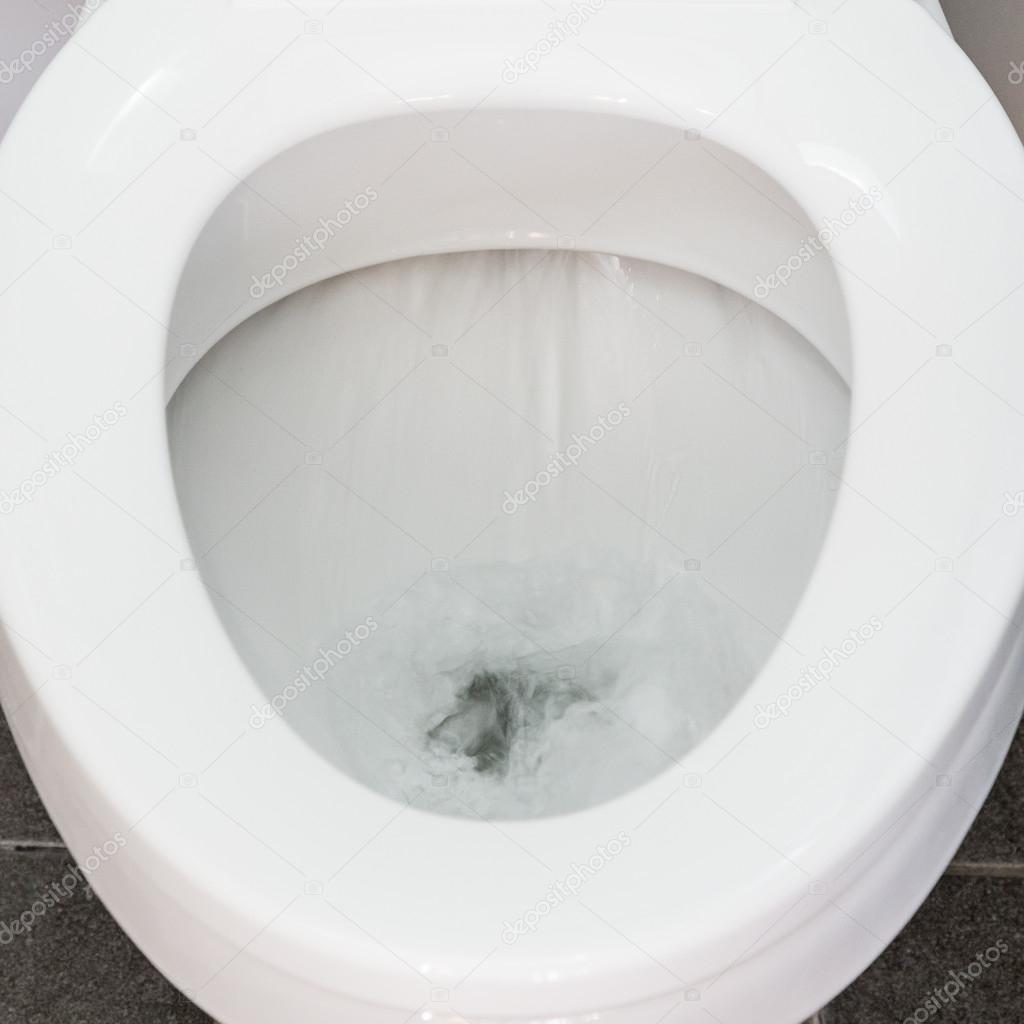 Toilet Flushing Water close up
