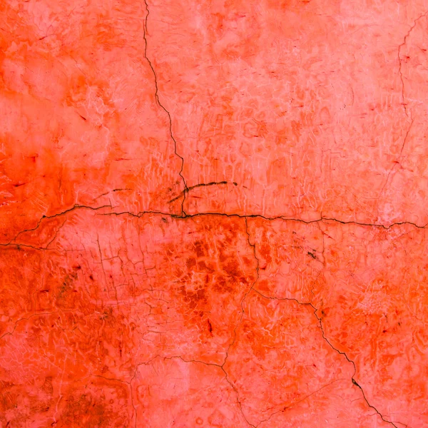 Textura de la pared de grieta de cemento rojo y fondo . — Foto de Stock