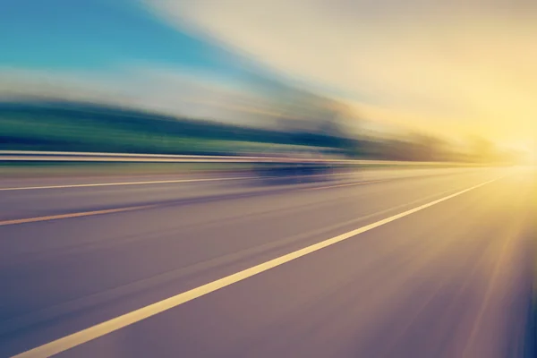 Abstract empty asphalt blurry road and sunlight with space — Stock Photo, Image