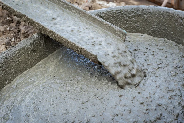 Pouring cement during for construction — Stock Photo, Image