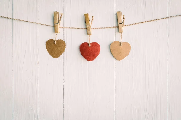 Heart on white wooden background with Vintage style. — Stock Photo, Image