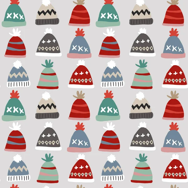 Modèle sans couture de Noël avec des chapeaux tricotés colorés. Ensemble de casquettes en laine. Conception de mode nordique pour enfants dessinés à la main. Illustration vectorielle d'hiver scandinave. — Image vectorielle