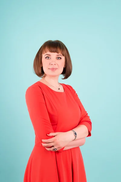 Cheerful confident business woman isolated over turquoise background with copyspace for your text. — Stock Photo, Image