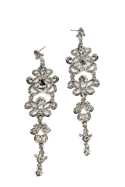 Pair of diamond earrings on white background. — Stock Photo, Image