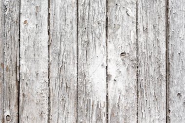 Siyah beyaz tahtalardan yapılmış eski boyanmış ahşap çit. Tasarım için soyut arkaplan ve doku.