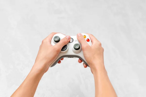 Hand Holding Gamepad Grey Concrete Background Man Controller Playing Video Stock Photo